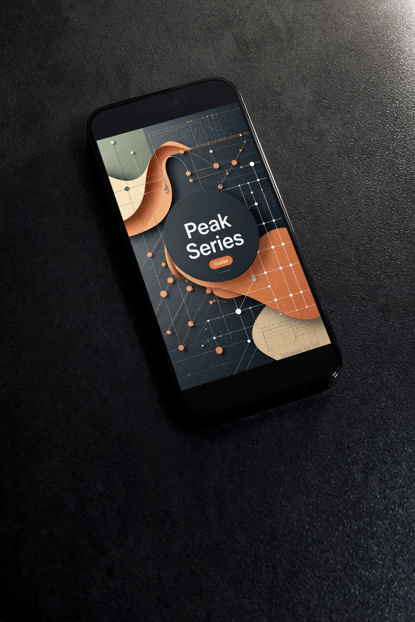 A black smartphone lying diagonally on a dark textured surface, displaying a digital app or service graphic with the words 'Peak Series' in white over an abstract orange, beige, and dark gray design.